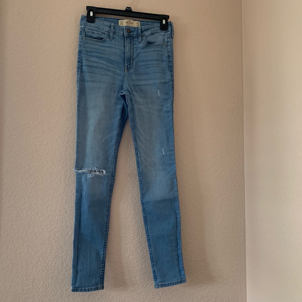 High waist light wash jeans with distressing